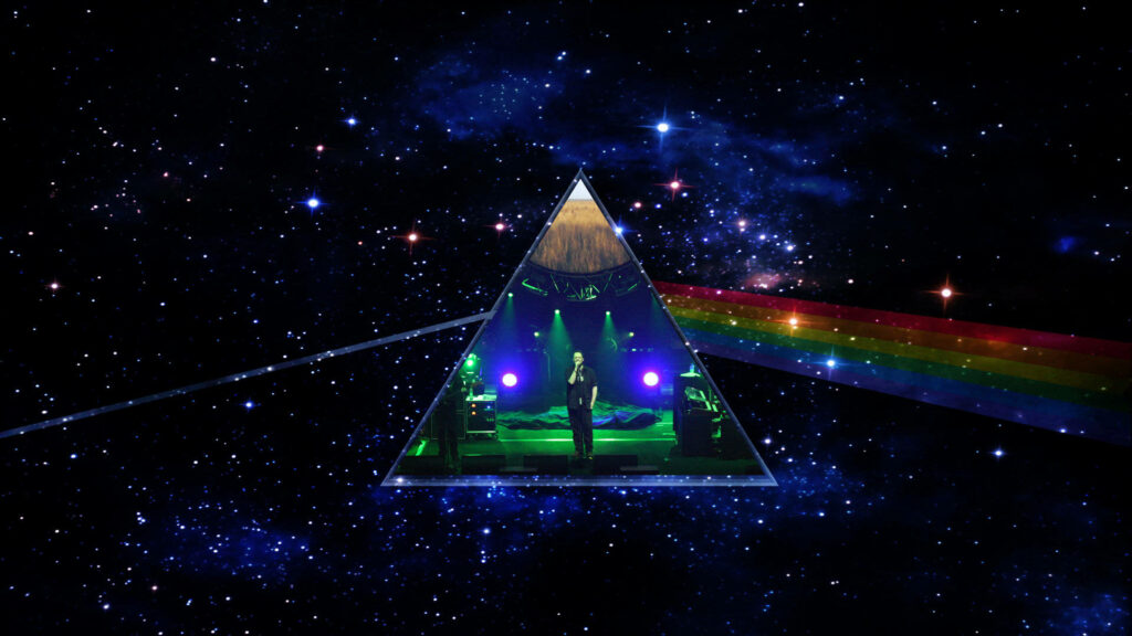 Pink Floyd's Mesmerizing Cosmic Concert: A Prism'd Voyage through Sparkling Stars Wallpaper