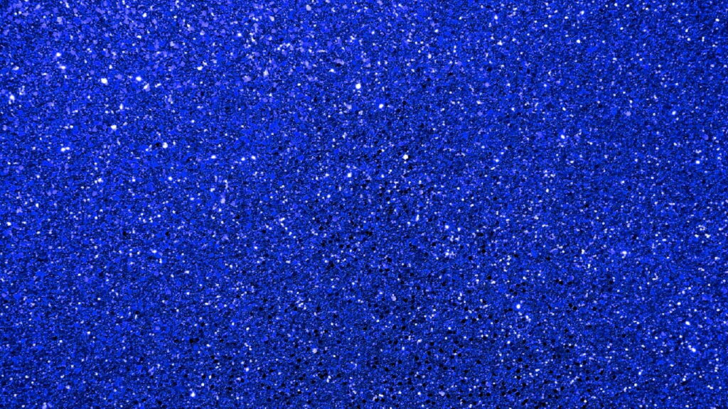 Sparkling Rainbow: Mesmerizing Blue Glitter Delightfully Dances with Vibrant Colors Wallpaper