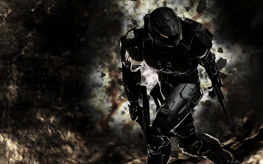 Spartan in black Mjolnir armor emerging from explosion Halo PC gaming wallpaper background