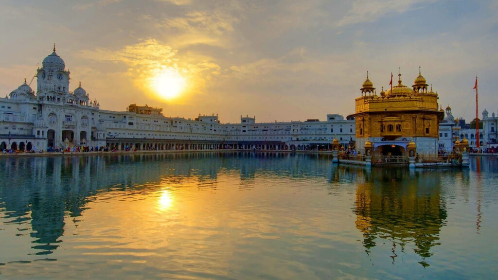 Golden Temple Amritsar sunset reflection sacred pool spiritual serene HD wallpaper background