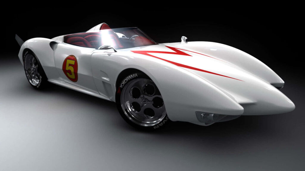 Mach 5 Speed Racer white sports car with red details and number 5 emblem on dark background Wallpaper