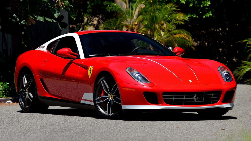 Captive Elegance: Unleashing the Power and Beauty of the Enchanting Red Ferrari 599 GTB Fiorano Wallpaper