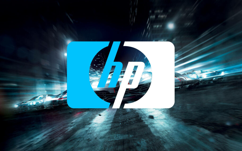 Speeding Towards Productivity: HP Laptop Logo Shines amidst Blur of Racing Cars Wallpaper