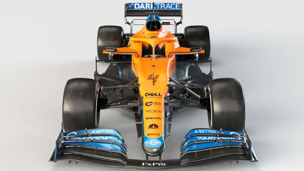 Dynamic Masterpiece: Daniel Ricciardo's F1 Speedster in a Captivating Simplicity Wallpaper