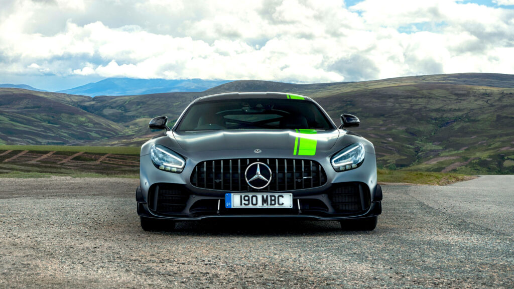 Exquisite Combination: The Elegance of a 2019 Mercedes AMG GTR Pro Showcasing Gloss Light Green with Selenite Gray Magno Finish Wallpaper