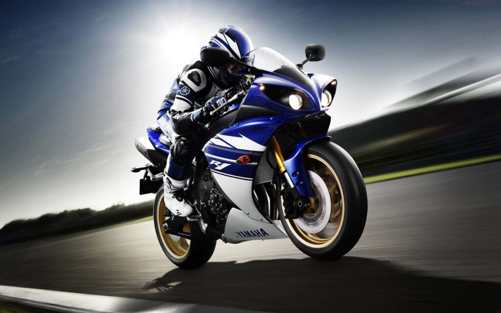 Dynamic Yamaha Motorcycle Wallpaper: Speed & Precision on Racetrack