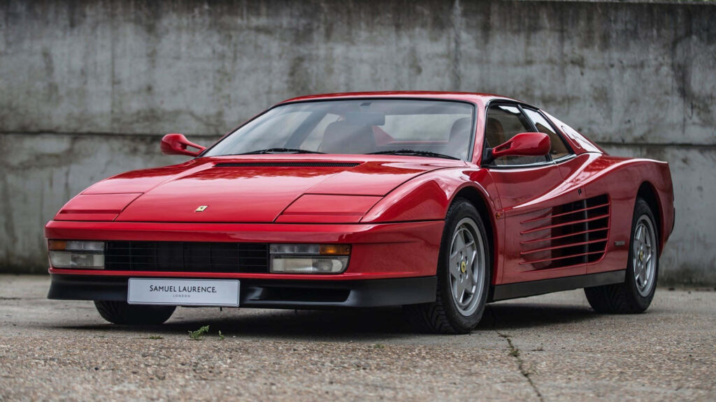 Ferrari Testarossa: Embodying Timeless Elegance and Unbridled Power on an Open Road Wallpaper