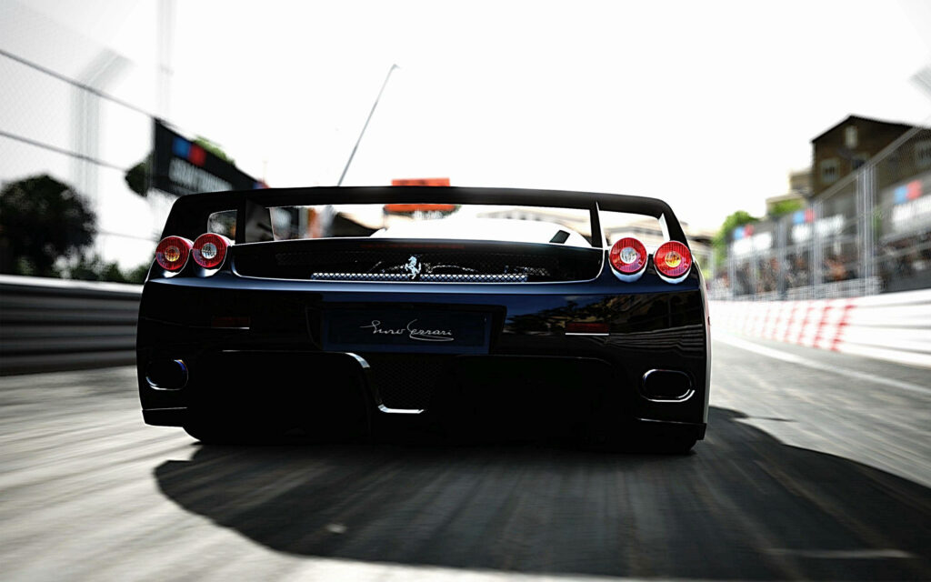 Speed and Style Captured: Legendary Ferrari F40 Shines in Brilliant Blue Wallpaper