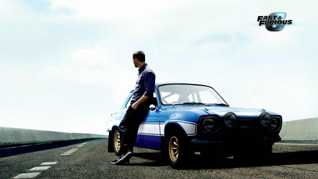Furious Alliance: Paul Walker Strikes a Cool Pose by the Speedy Ride in HD Wallpaper