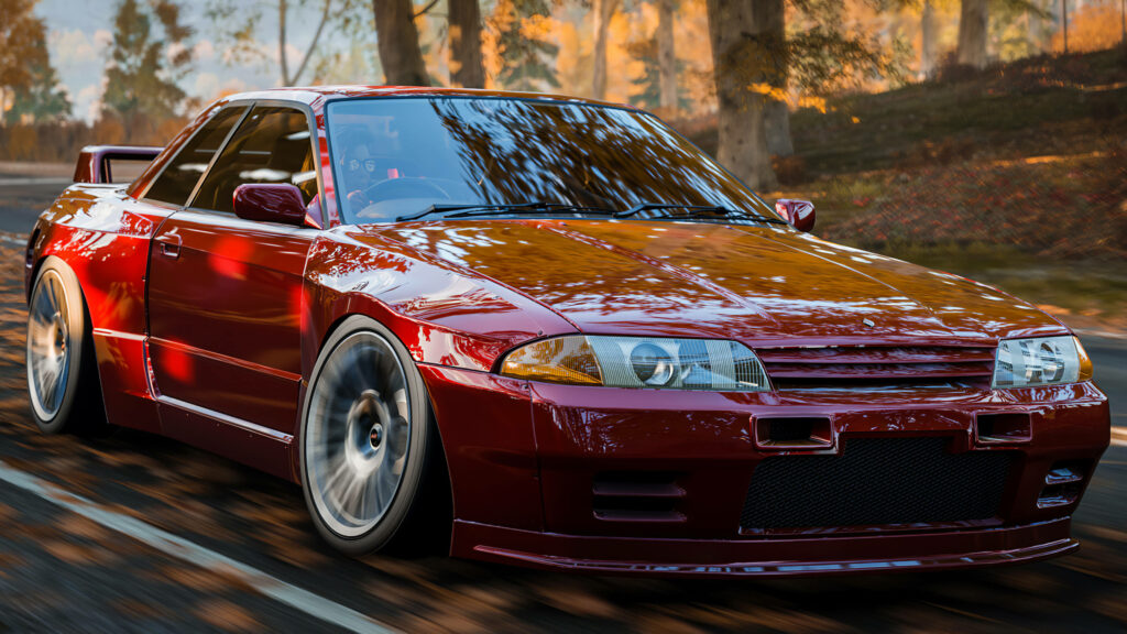 Vibrant Nissan Skyline Speeds through Lush Forest in Forza 4's Breathtaking Scenery Wallpaper