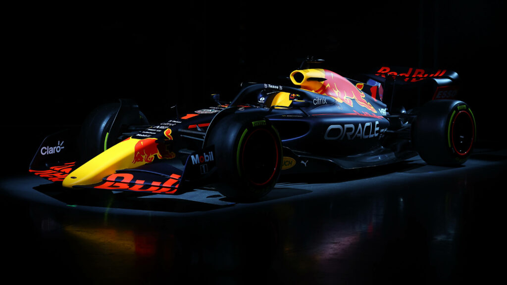Revving Excitement: A High-Definition Red Bull F1 Race Car Wallpaper for Your Laptop