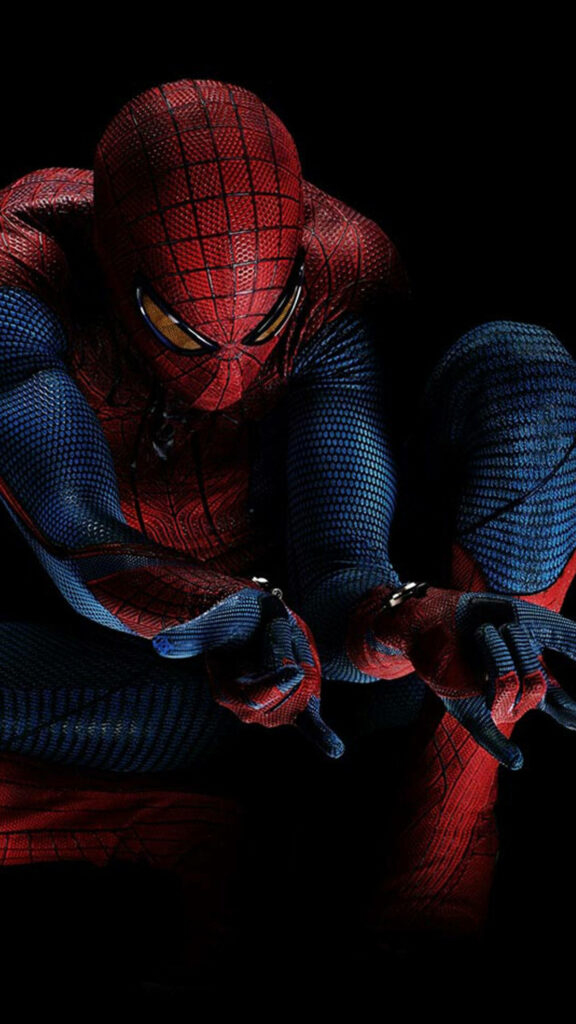 Spidey Web Hero: Breathtaking Dark Mobile Background featuring Spider-Man in Red and Blue Suit Wallpaper
