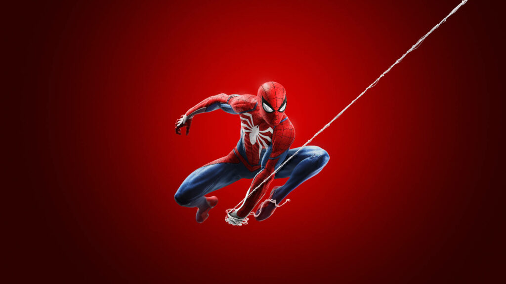 Spectacular Spider-Man Leaping into Action Against Crimson Backdrop Wallpaper