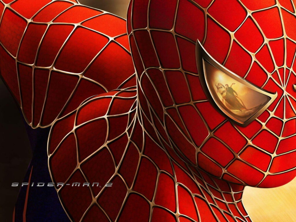 Close-up Spider-Man 2 wallpaper with red-blue suit, web patterns, and eye reflection detail