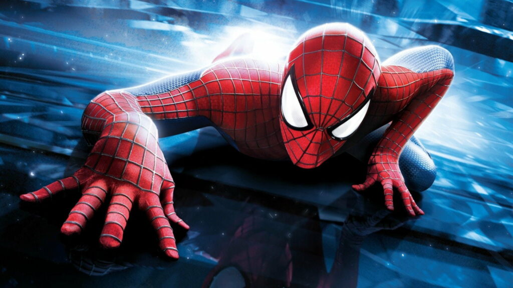 Spider-Man crawling pose HD wallpaper with vibrant blue and black background for laptops