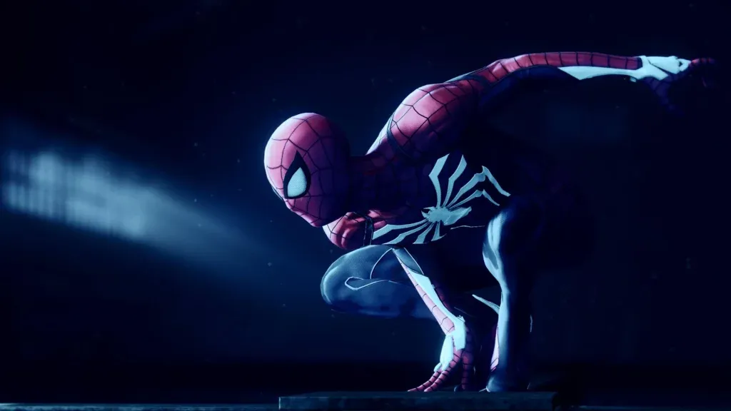 Spider-Man in signature suit crouching ready for action dark atmospheric Marvel game wallpaper