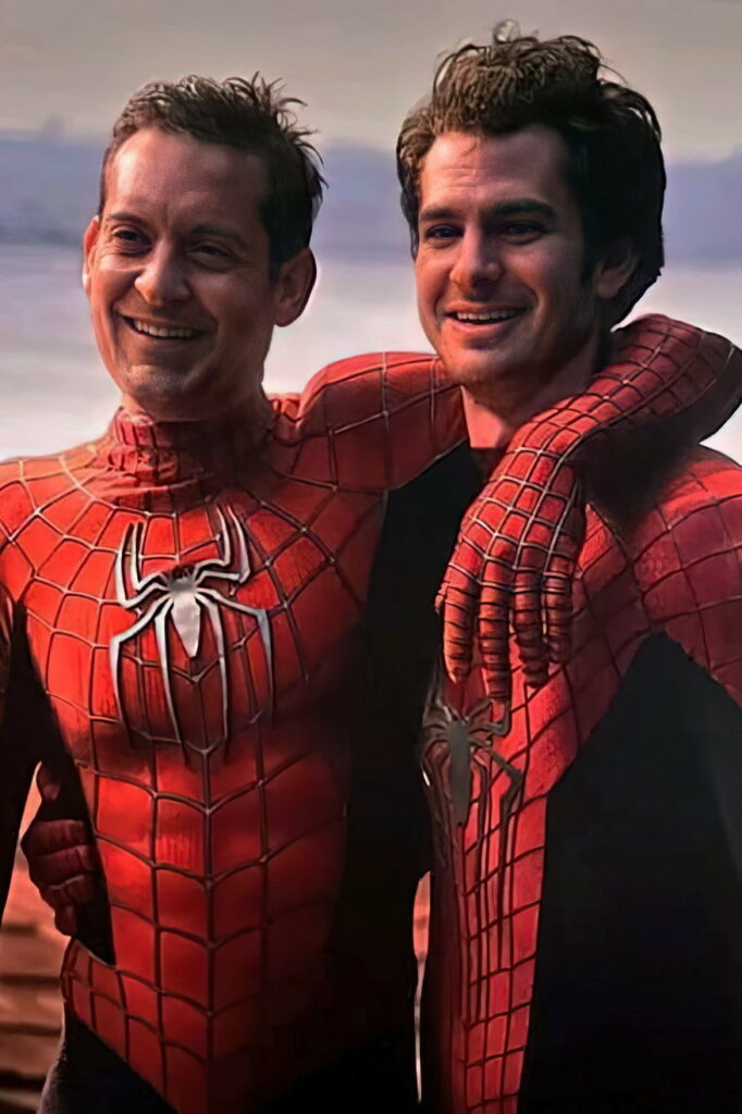 Spiderman No Way Home HD wallpaper with two Spiderman versions smiling in iconic suits side by side