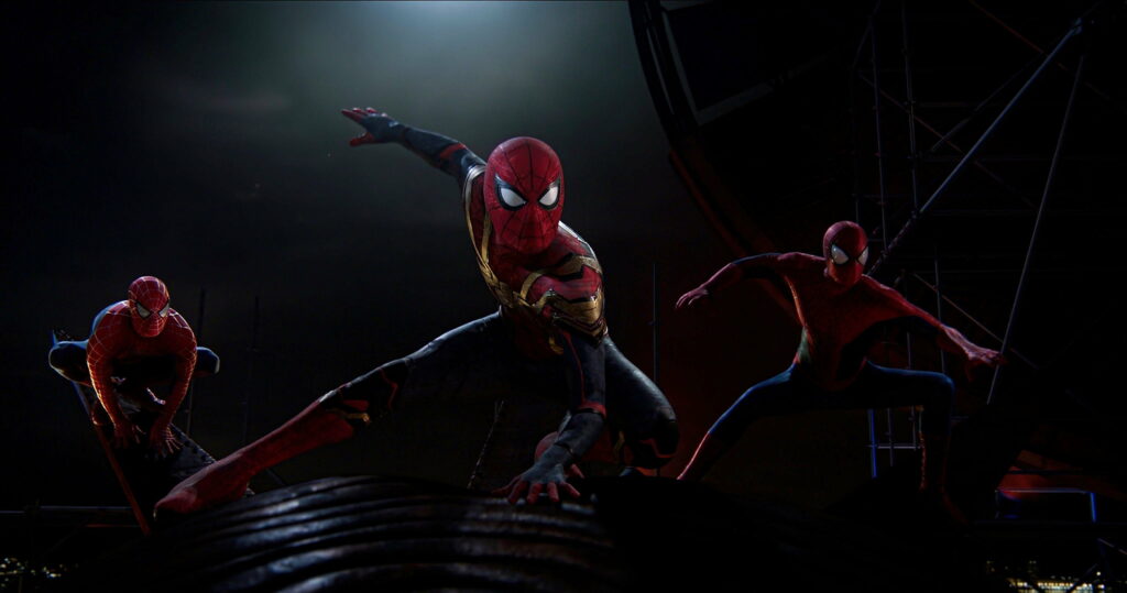 Spiderman No Way Home HD wallpaper with three Spider-Men ready for action at night