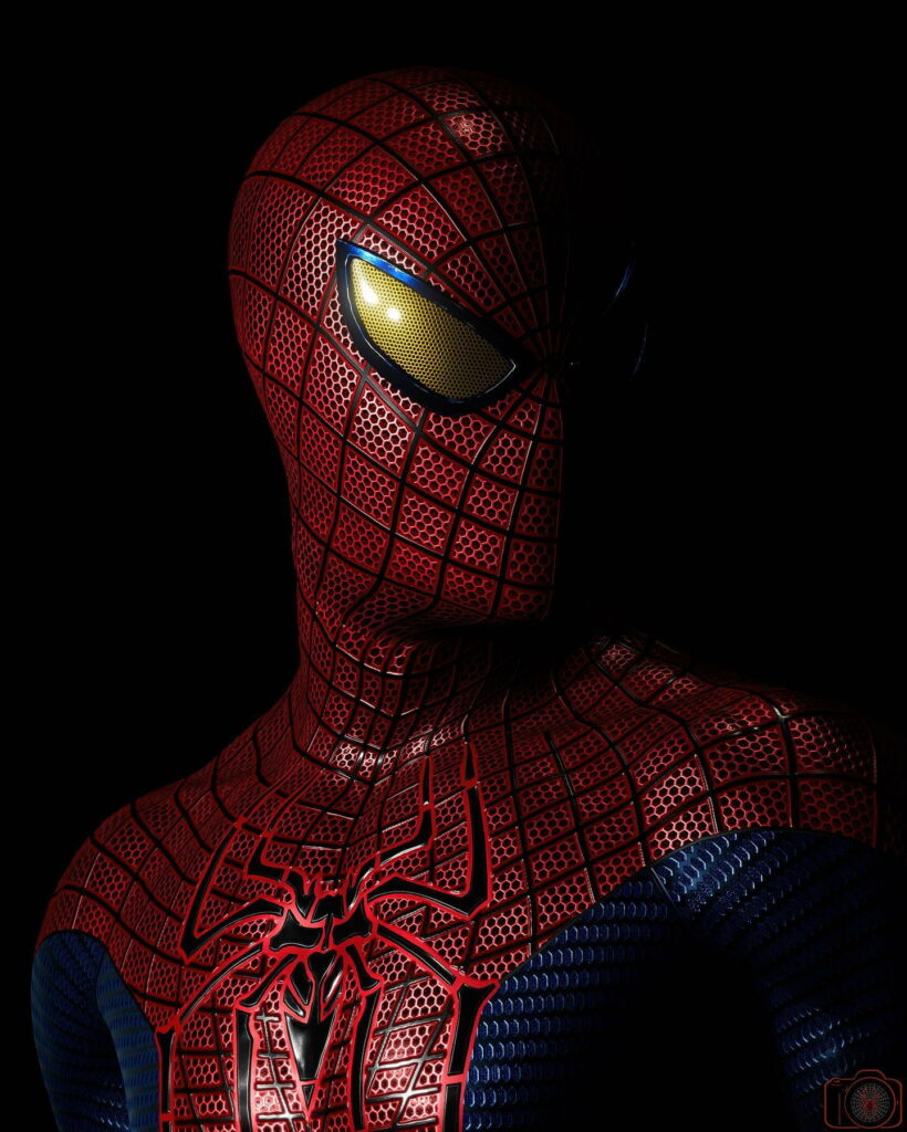 Close-up HD Spiderman wallpaper with glowing eye, detailed red-blue suit for AMOLED screens