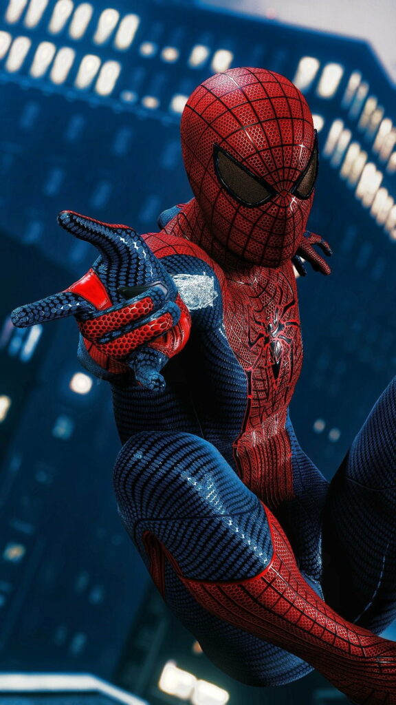 Spiderman in red and blue suit swinging through city at night HD dynamic movie wallpaper