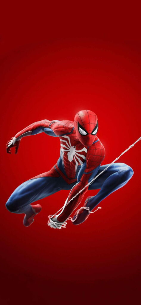Spiderman mid-leap in iconic suit with web-slinging action on bold red HD phone wallpaper