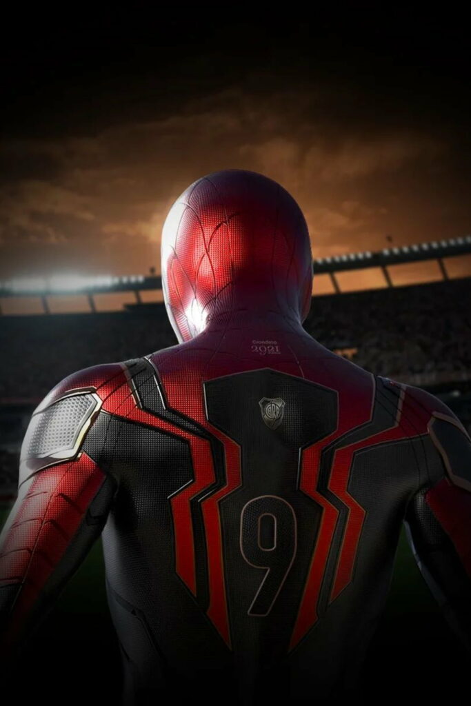 Spiderman in detailed suit with number 9 stands in stadium at vibrant sunset HD wallpaper
