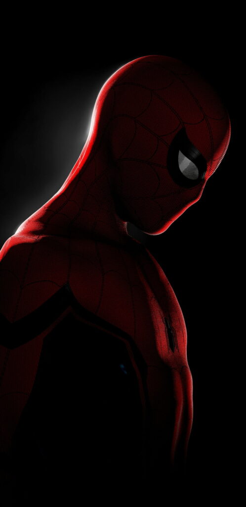 Spiderman in red and black suit in shadows with dramatic lighting on black AMOLED wallpaper