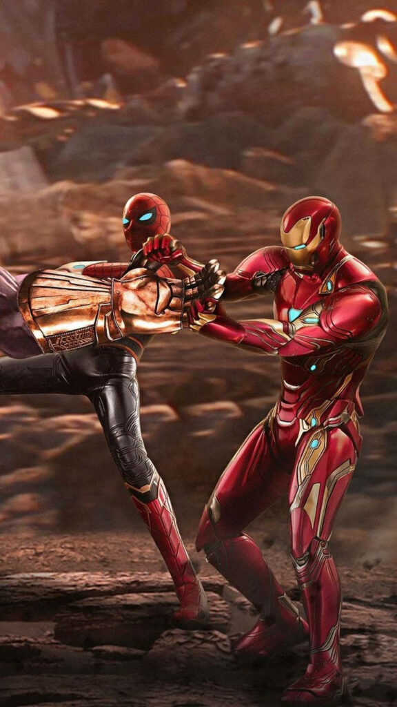 Spiderman and Iron Man holding Infinity Gauntlet in intense battle scene superhero wallpaper