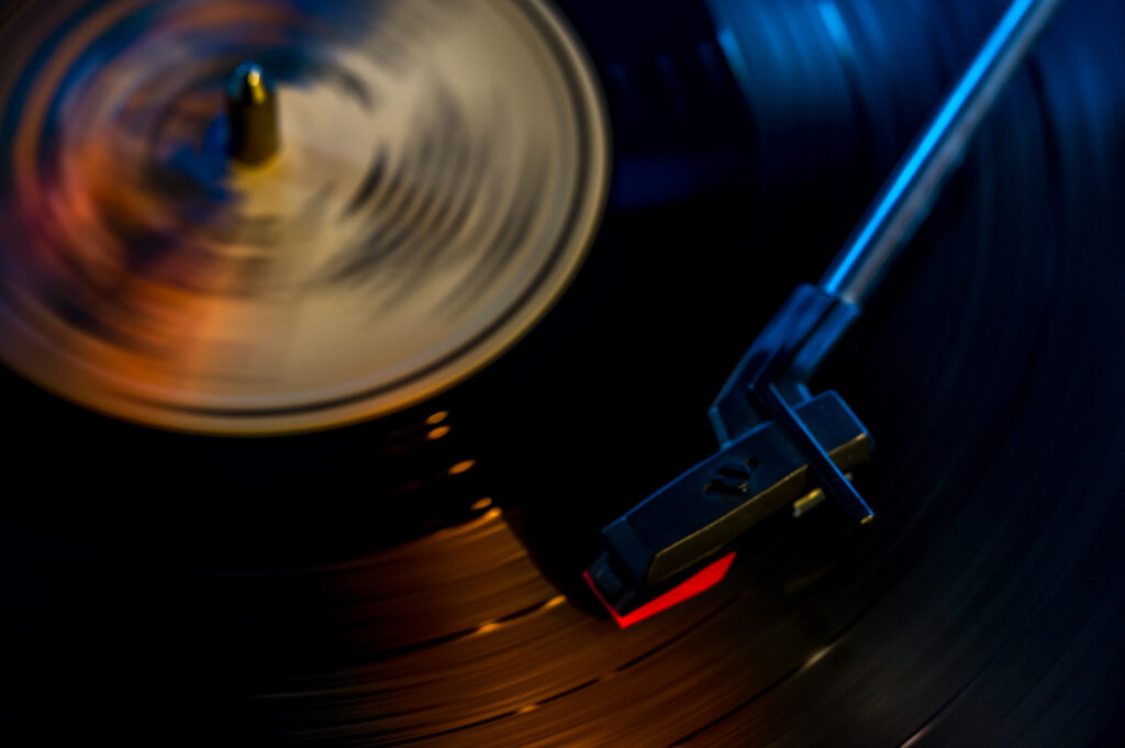 Close-Up Spinning Vinyl Record Wallpaper - Nostalgic Analog Music