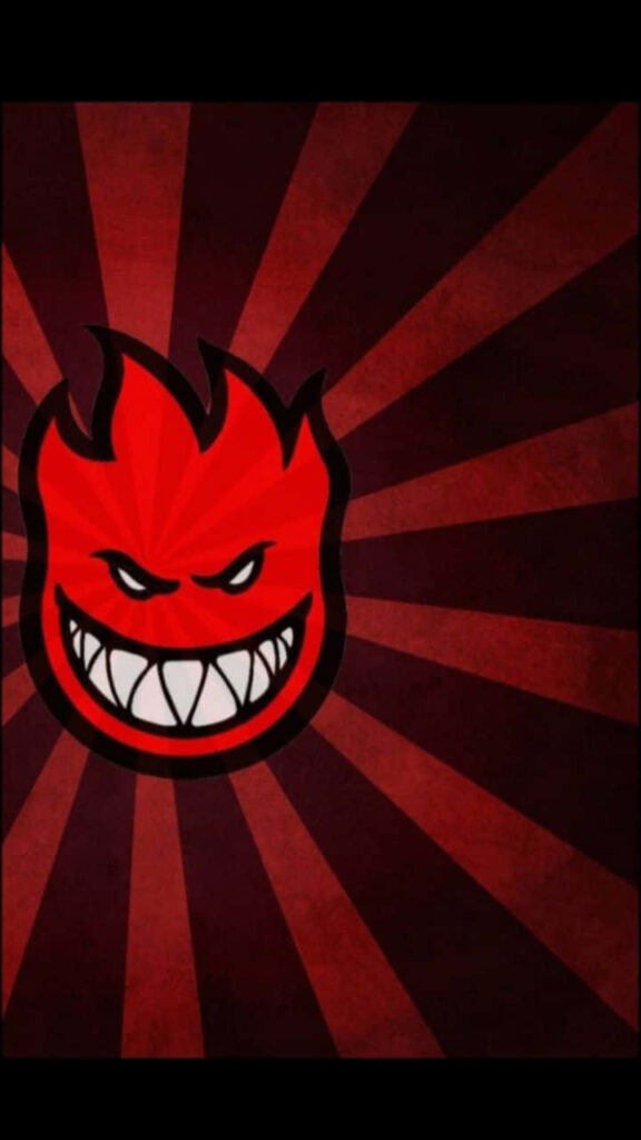 The Radiant Spitfire Skate Logo, with Vibrant Red Rays Illuminating the Background Wallpaper