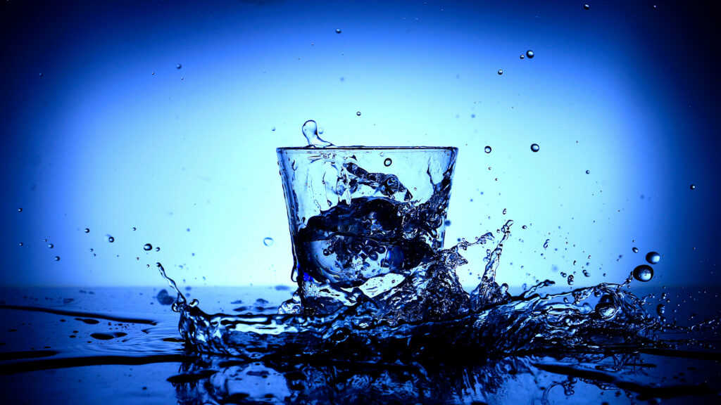 Refreshing Splash: A Captivating Cool Water Background Wallpaper