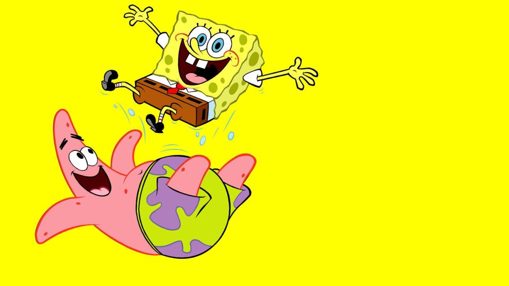 SpongeBob SquarePants joyfully leaps over Patrick Star cartoon on bright yellow background wallpaper