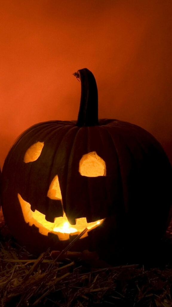Spooky Spectral Smartphone: Unleash Your Halloween Enthusiasm with this Adorable Ghastly Gadget! Wallpaper