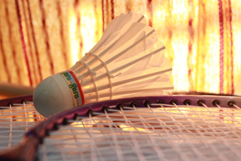 Thrilling Badminton Battle: Sportsmanship Unleashed in Epic Racquet Match Wallpaper