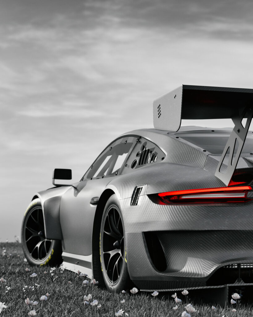 Sleek Grey Tuning Car Wallpaper with Carbon Accents & Racing Background