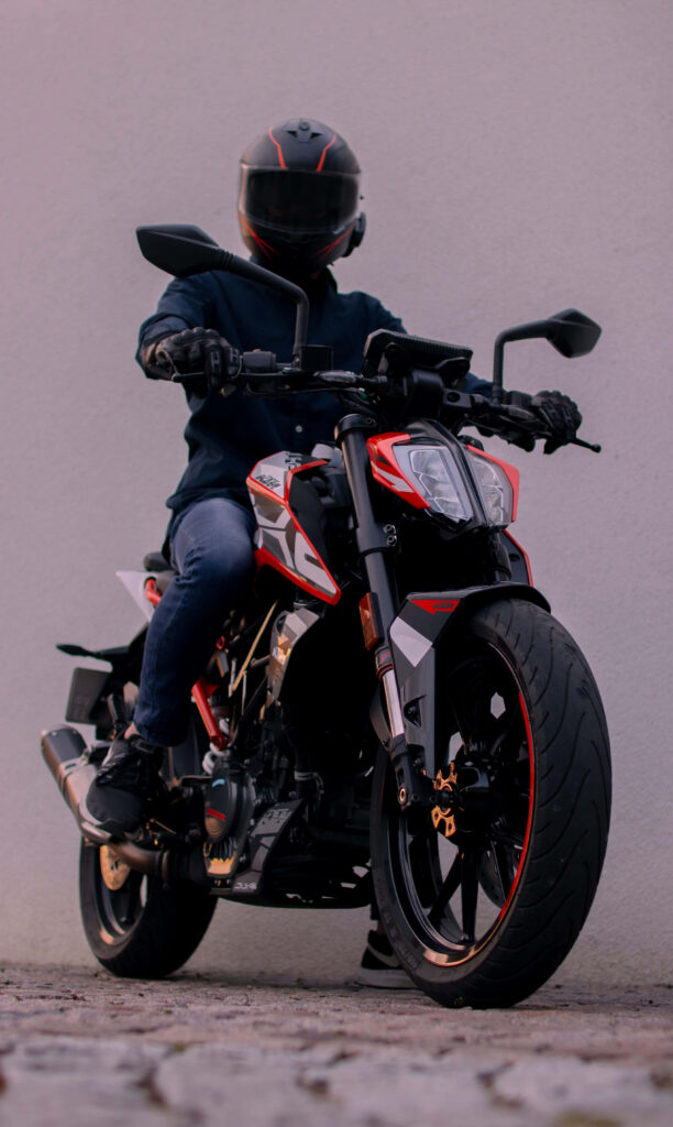 Sporty KTM Duke 390 Wallpaper: Dynamic Black & Red Motorcycle Design