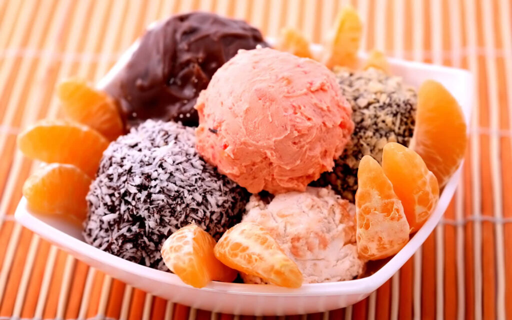 Spring Delights: A Vibrant Platter of Tempting Desserts - A Feast for the Senses! Wallpaper