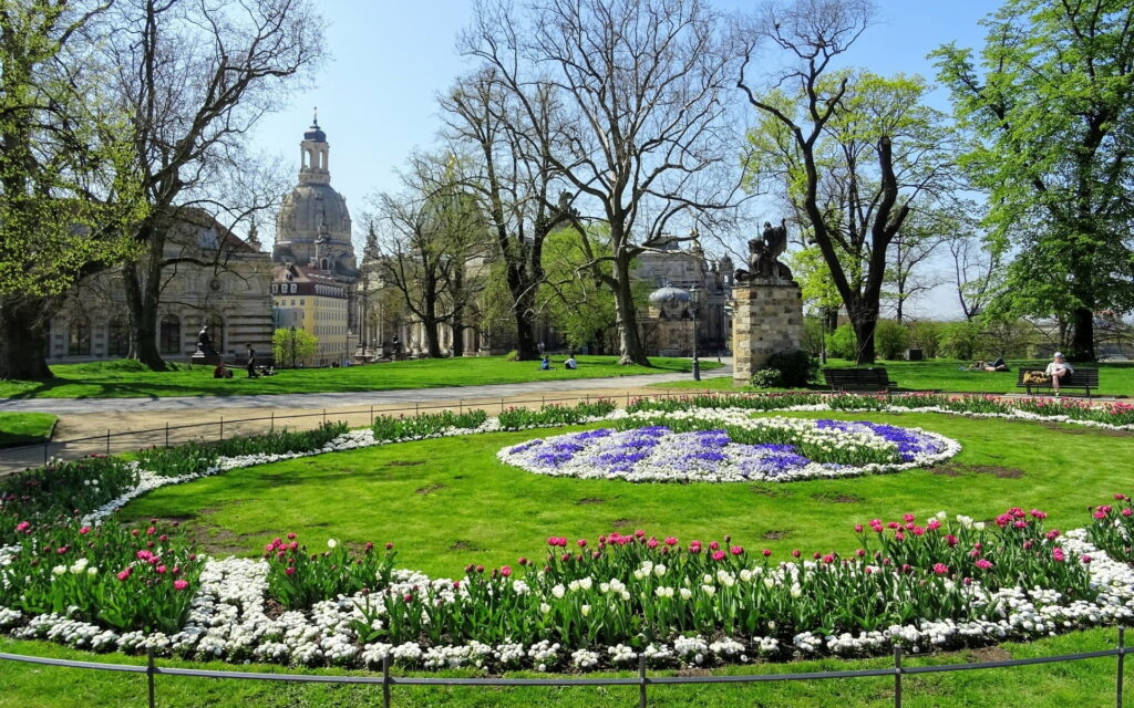 Gorgeous Spring Gardens of Dresden: A Vibrant Tapestry of Blooming Trees, Flowers, and Sculptures - HD Wallpaper
