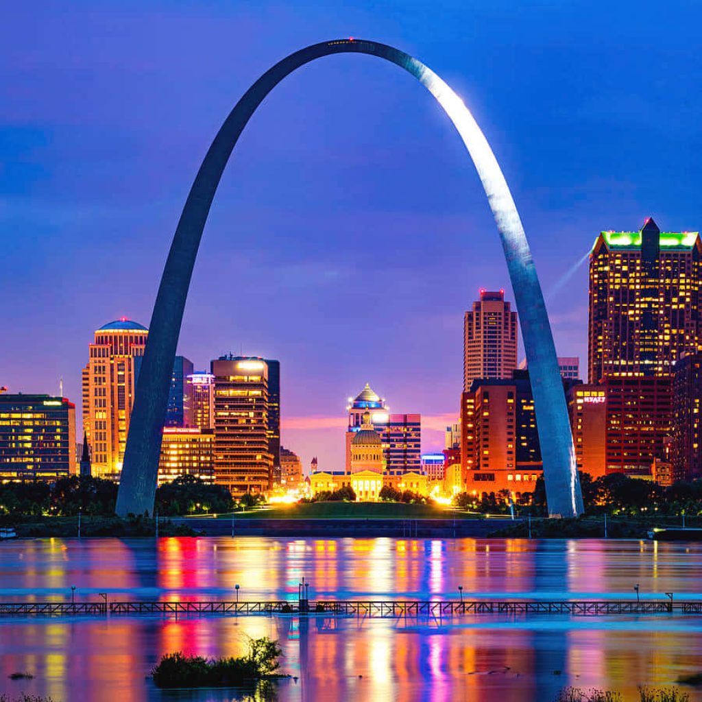 Gateway Arch at twilight with St Louis skyline and Mississippi River reflection wallpaper background