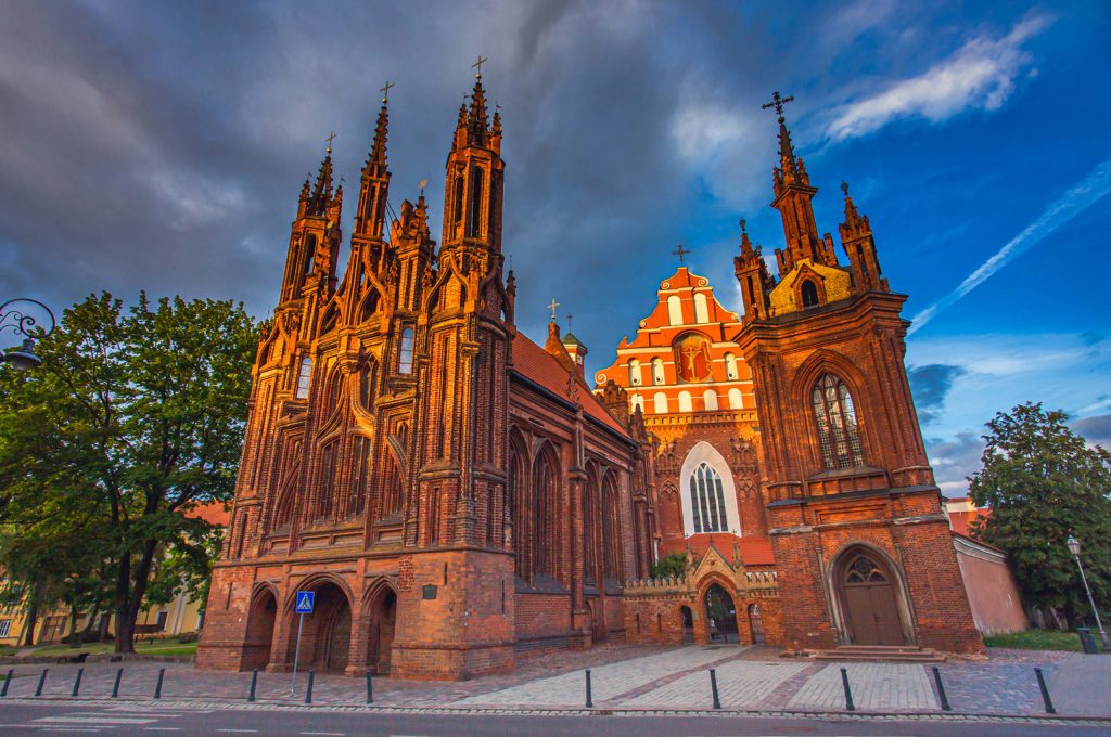 St Anne's Church Vilnius Lithuania Brick Gothic red brick spires sunset sky wallpaper background