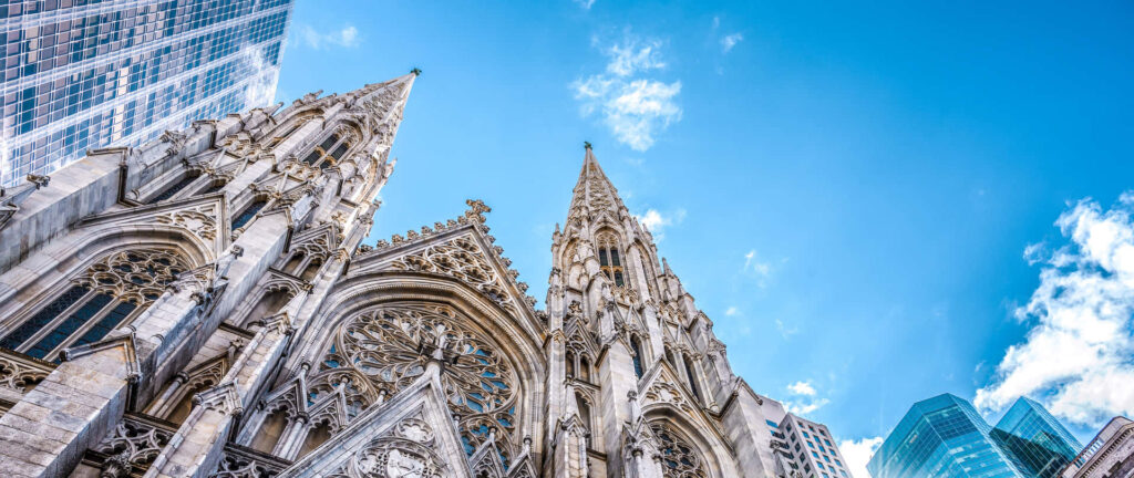 Stunning Saint Patrick's Cathedral Against Skyscrapers - Wallpaper Background