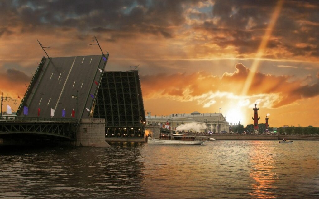 Serene St. Petersburg Wallpaper: Sunset over River & Raised Bridge