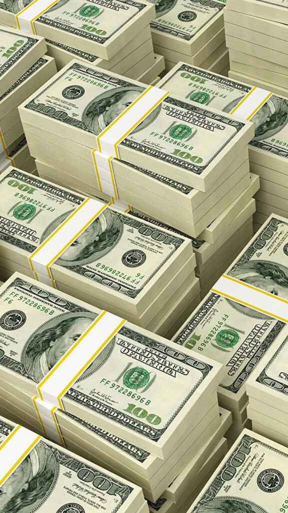 Stacks of Wealth: A Close-Up Glimpse into Abundant Cash in Bank Bundles Wallpaper