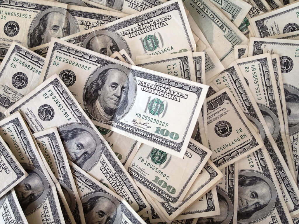 Wealth Stacks: Billowing Fortune as Desktop Bliss Wallpaper