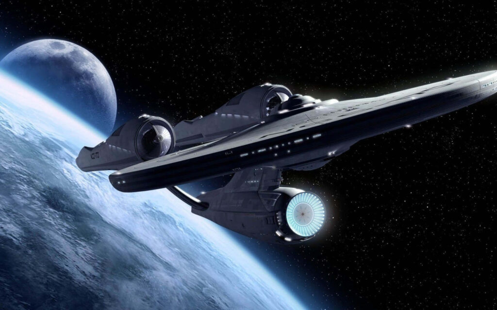 Star Trek Wallpaper: Iconic Starship Enterprise Orbiting a Planet