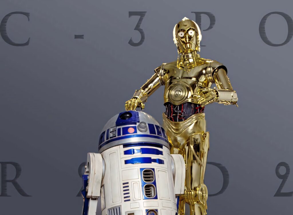 Star Wars wallpaper with C-3PO shiny gold and R2-D2 blue white droids on sleek gray background