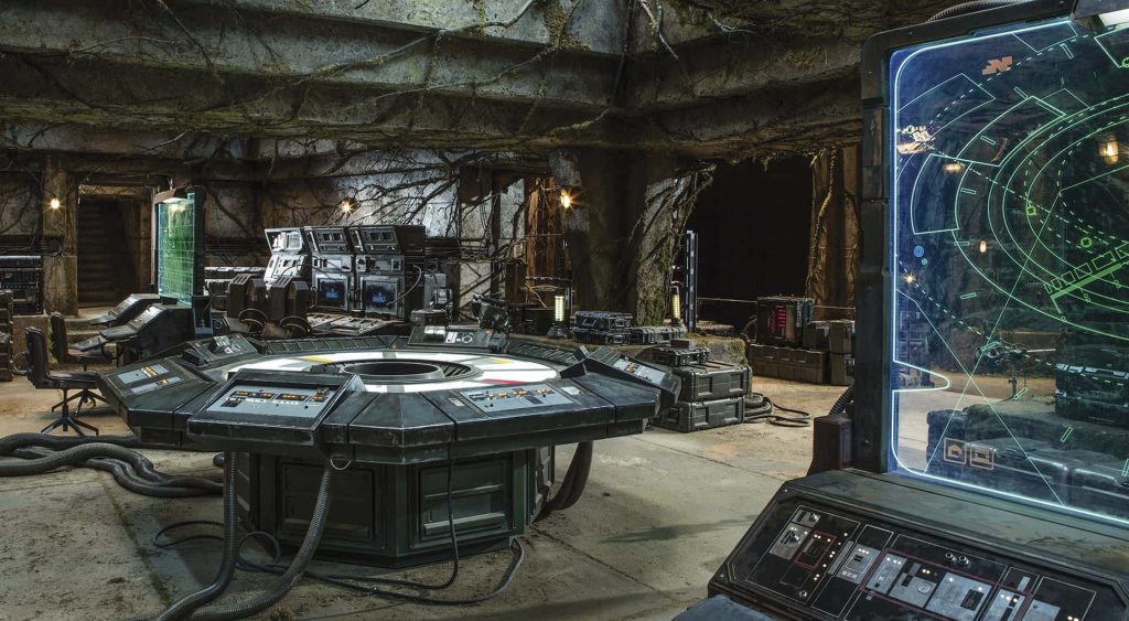 Star Wars Resistance command center with holographic displays rugged stone walls wallpaper background