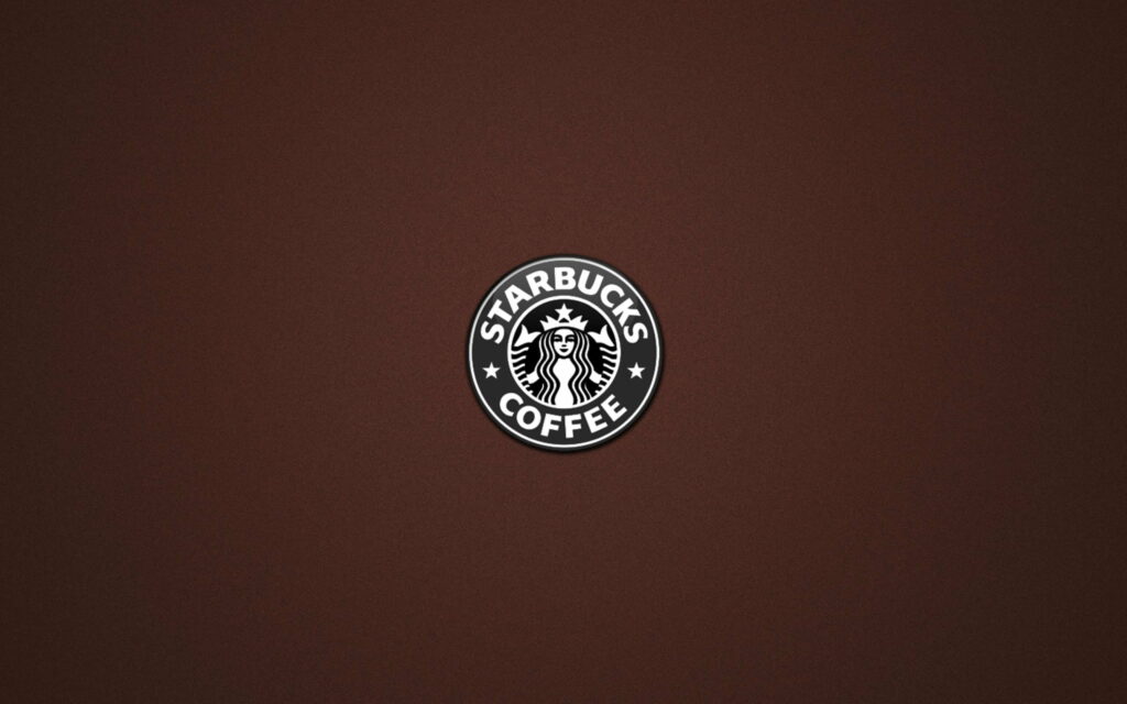 Coffee Culture Empowered: Starbucks Logo Unleashing its Brand Power as a Striking QHD Wallpaper
