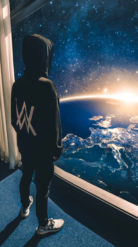 The Cosmic Symphony: Alan Walker's Enchanting Journey through Stardust Wallpaper