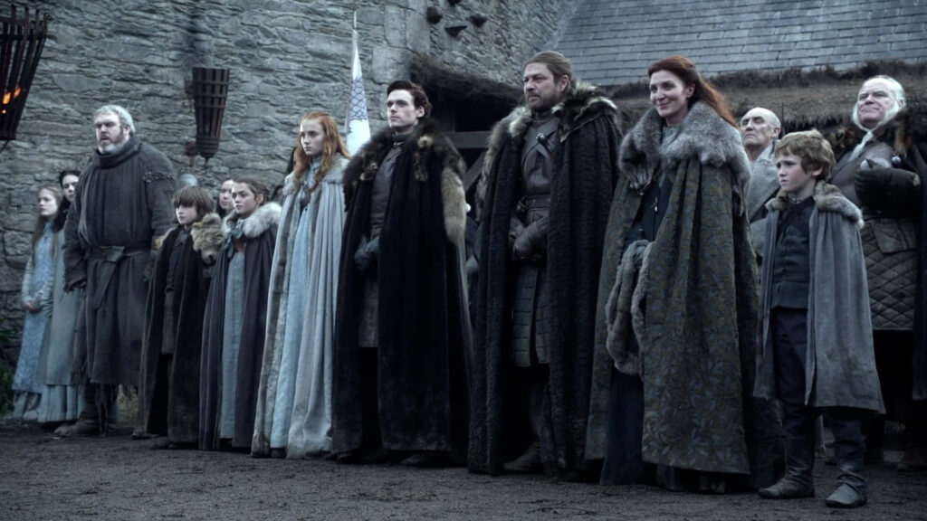 Stark Family Unity: Captivating Game of Thrones Winterfell Wallpaper